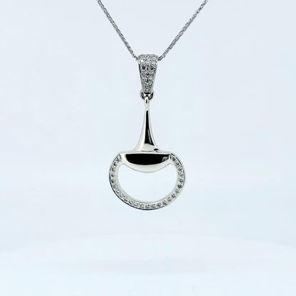 Product photo of Diamond set snaffle horse bit pendant in white gold by Crawford Hill Equestrian Jewellery.