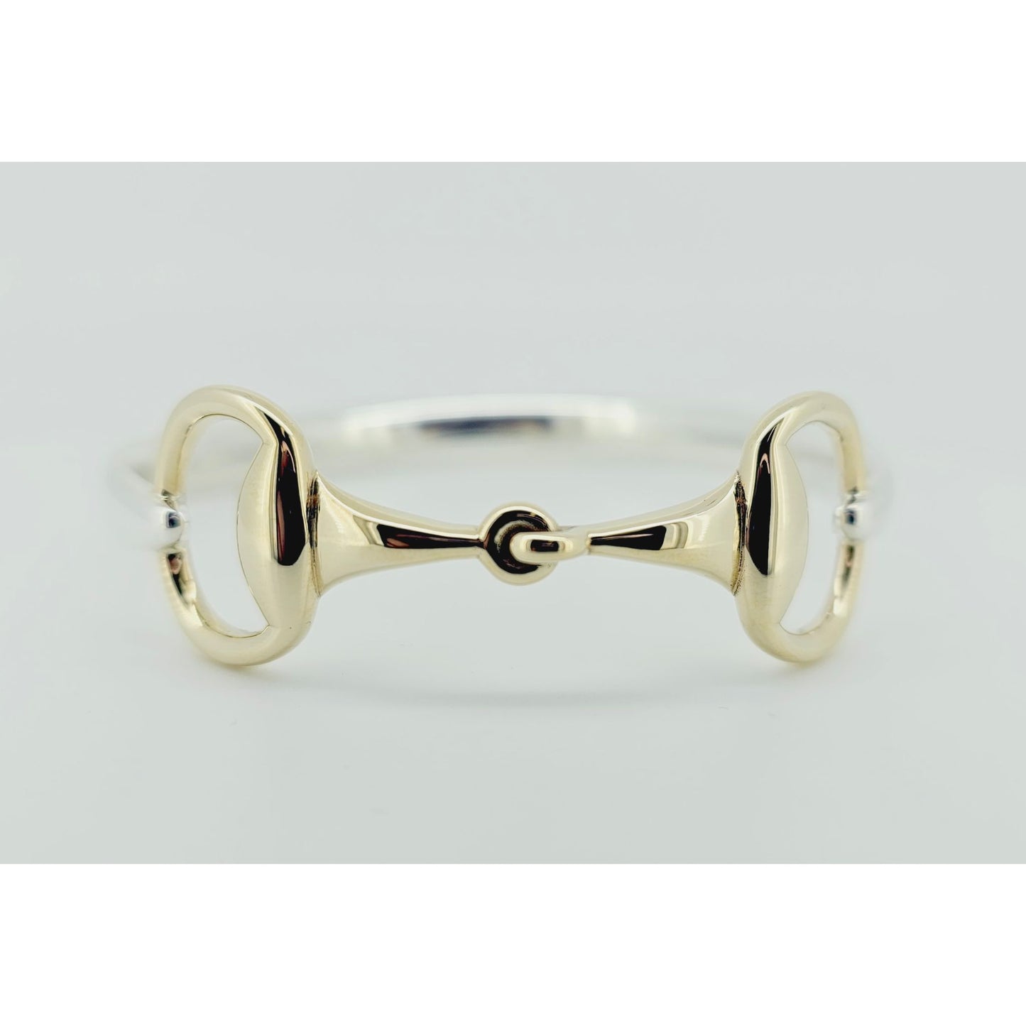 Product photo of horse bit snaffle bangle in old and silver. Bangle made by Crawford Hill Equestrian Jewellery. 