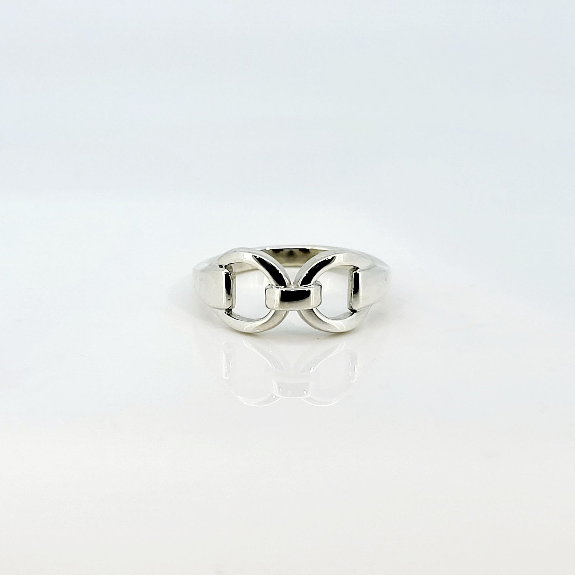 Product shop photo of a silver horse bit snaffle ring. Made by Crawford Hill Equestrian Jewellery. 